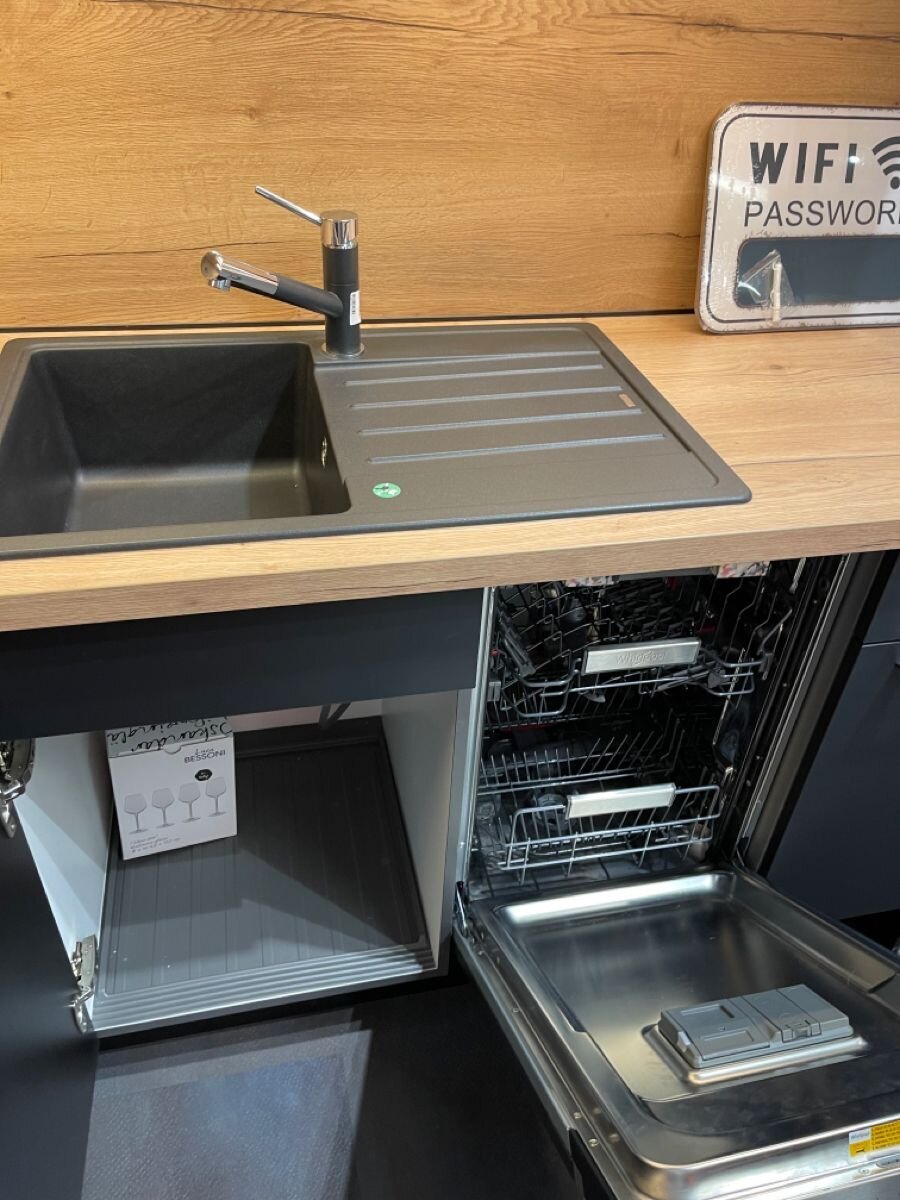 Rack and detergent dispenser check